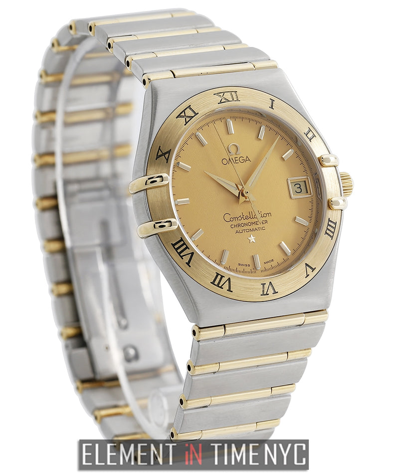 Steel & Yellow Gold 35mm Champagne Dial 2002
