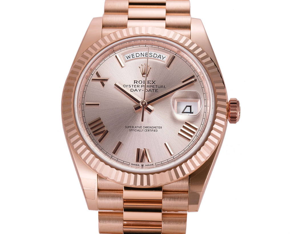 Rolex day date 40 outlet rose gold sundust dial